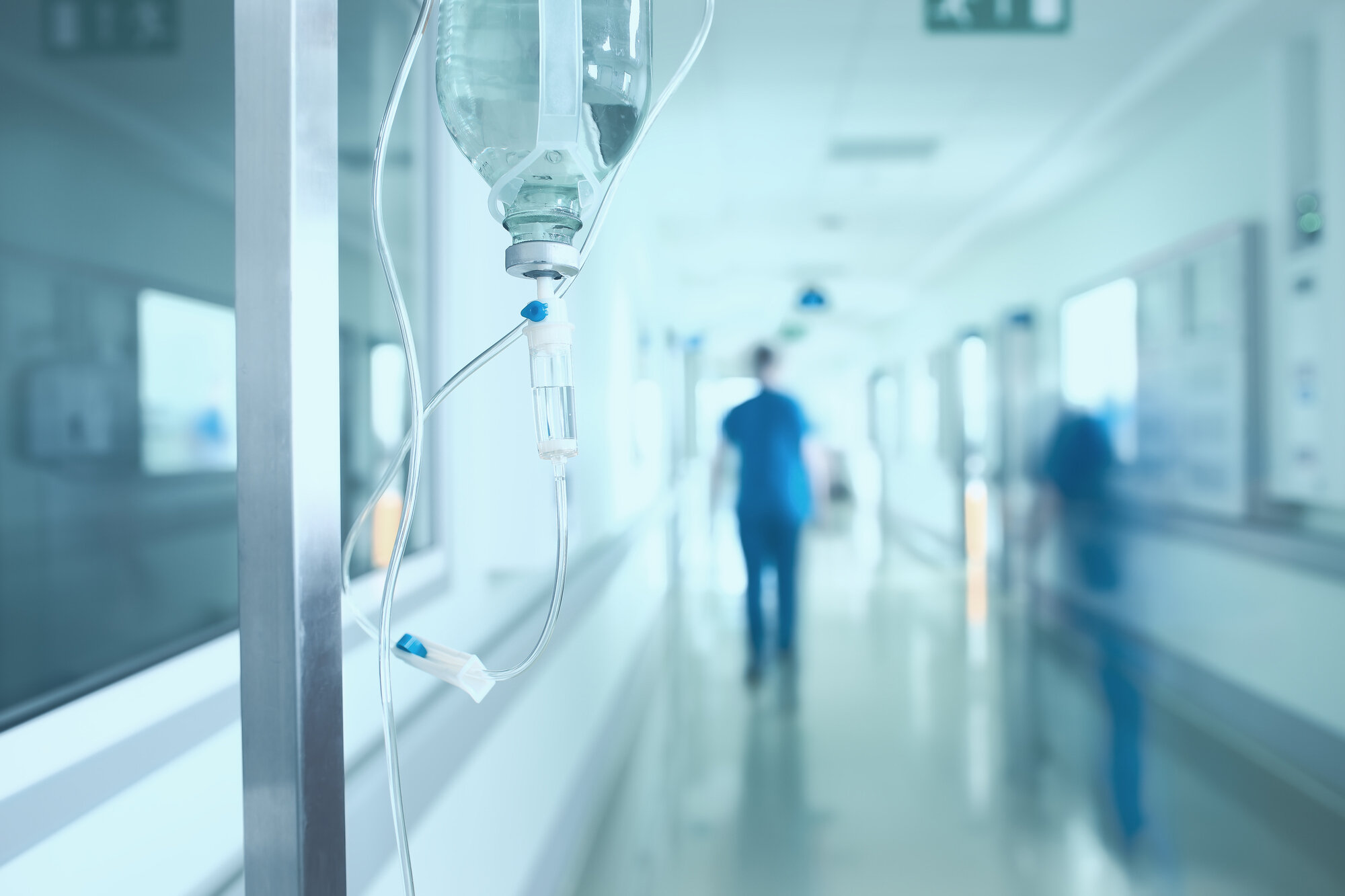 An IV drip in a hospital corridor
