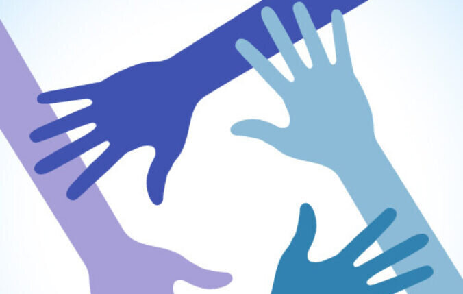 Four hands reaching out to each other