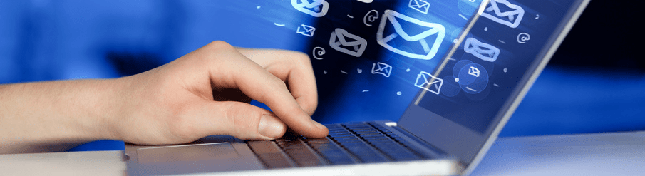 Person about to send an email on a laptop