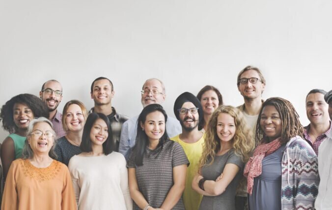 Group of people from different ethnicities smiling