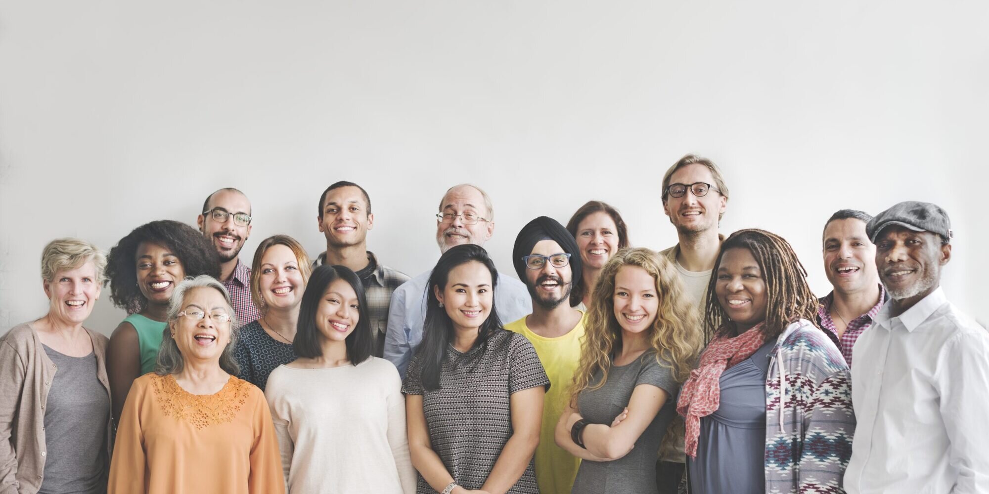 Group of people from different ethnicities smiling