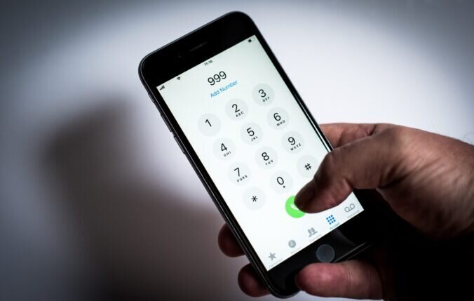 Person about to call someone on a mobile phone