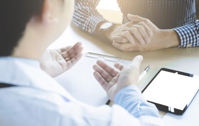 Close-up Of Patient and Doctor, Explaining About Disease