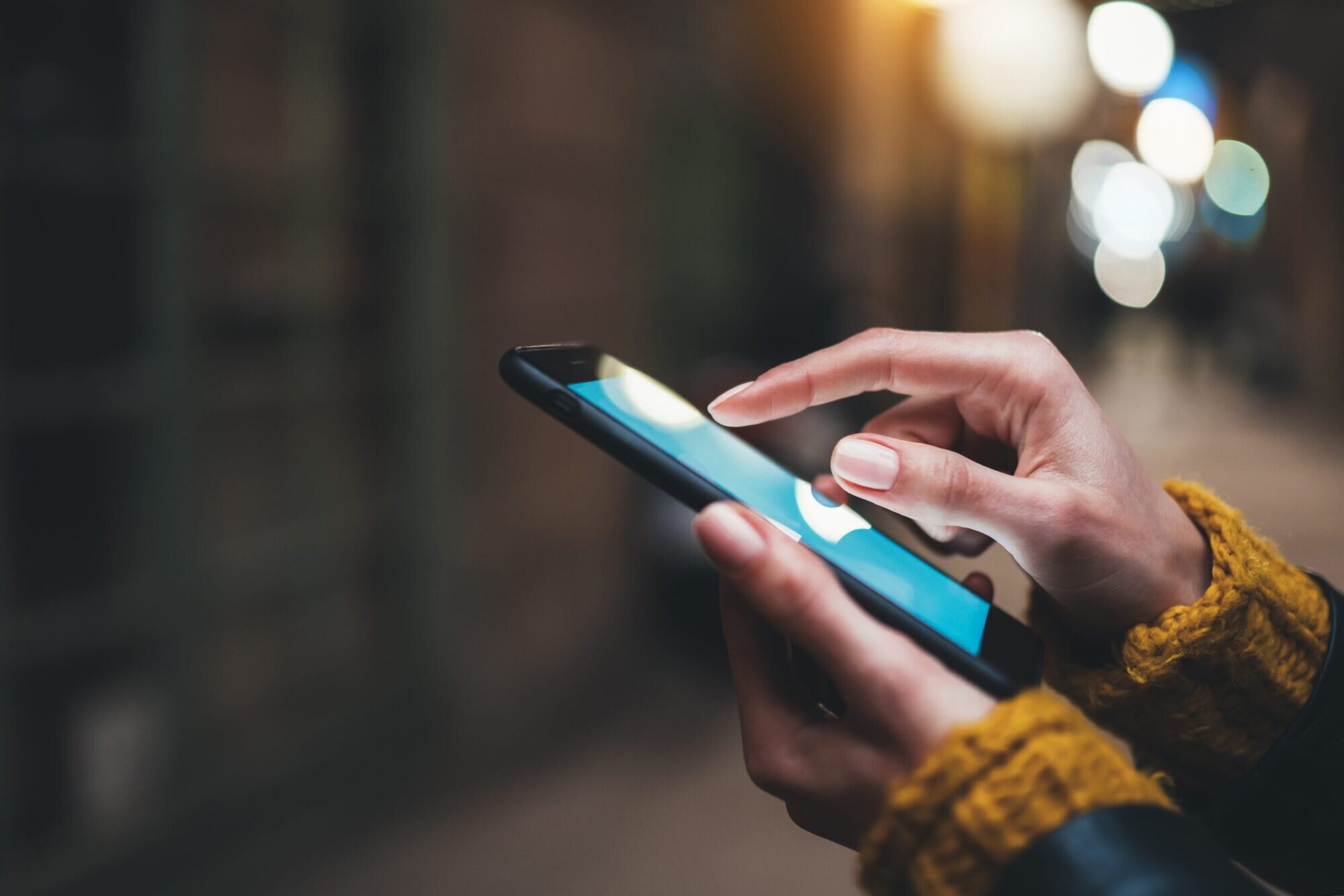 Close-up of a person texting on a mobile phone