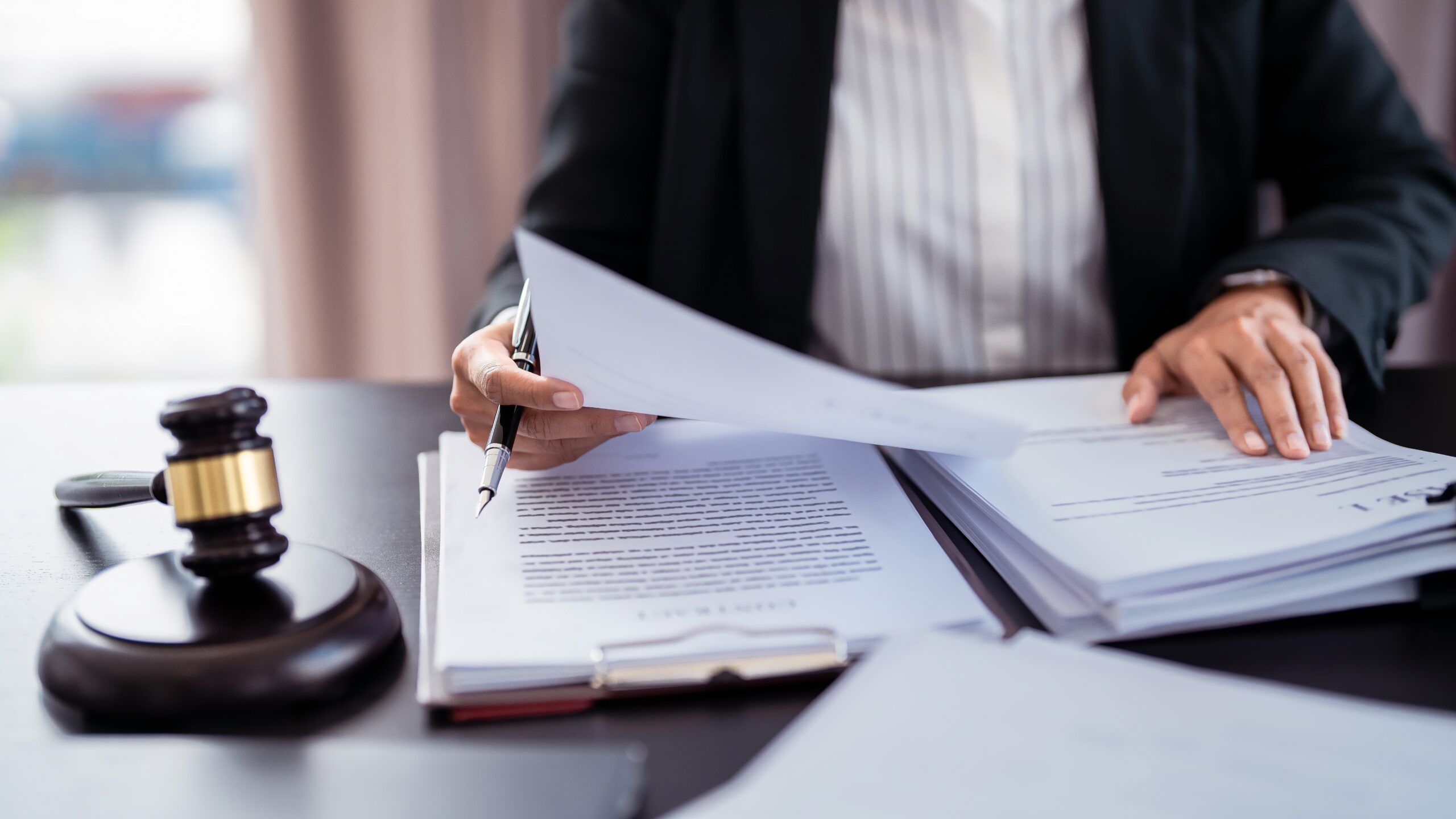 A person reading over a document